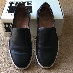 Men’s black leather Frye slip ons.